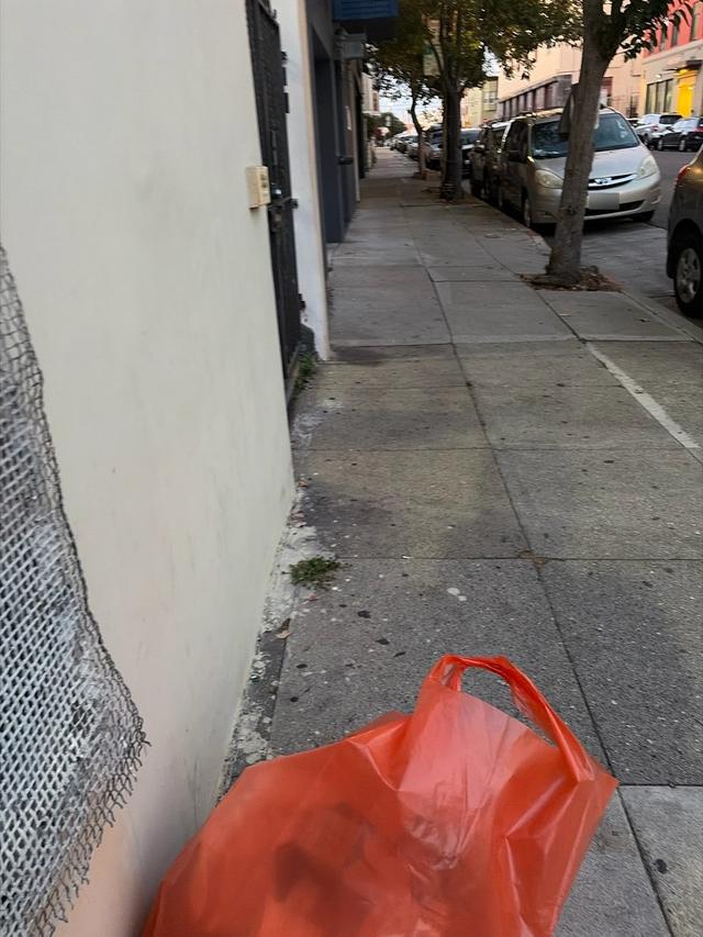 Sidewalk cleaned by the crew, Sunday, October 25, 6:30 PM
