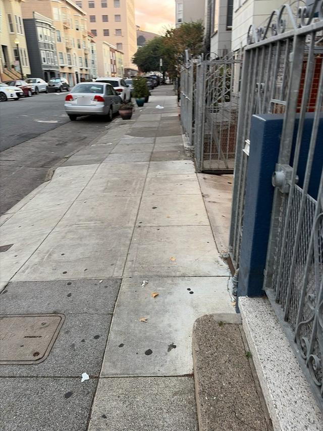 Sidewalk cleaned by the crew, Sunday, October 25, 6:21 PM